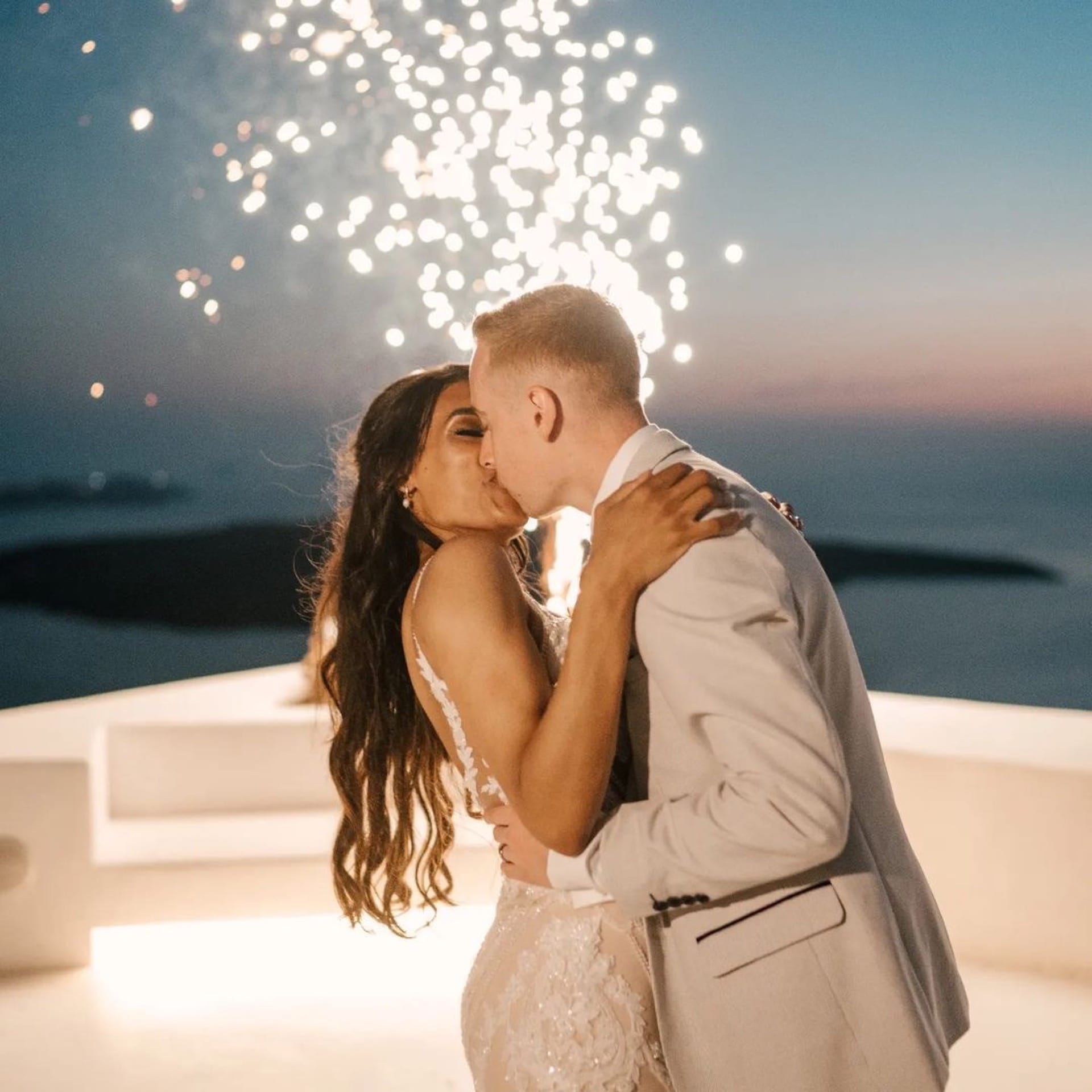 Groom and Bride giving their first kiss as married couple