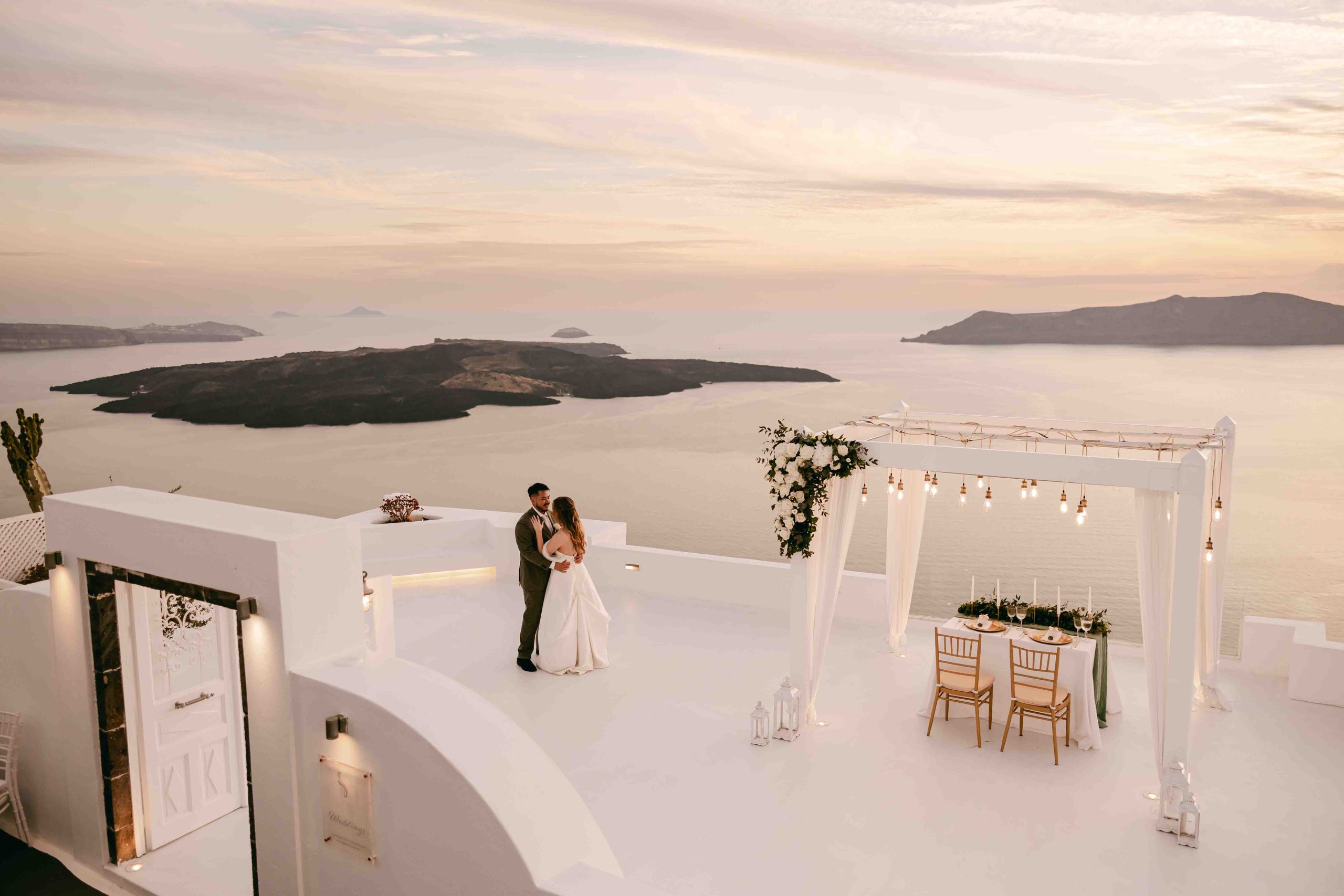 Married Couple in front of Scenery Caldera Backround